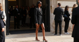 Ziwe Takes Fashion Month’s Thong Sandal Trend To The Courrèges Front Row In Orange Satin